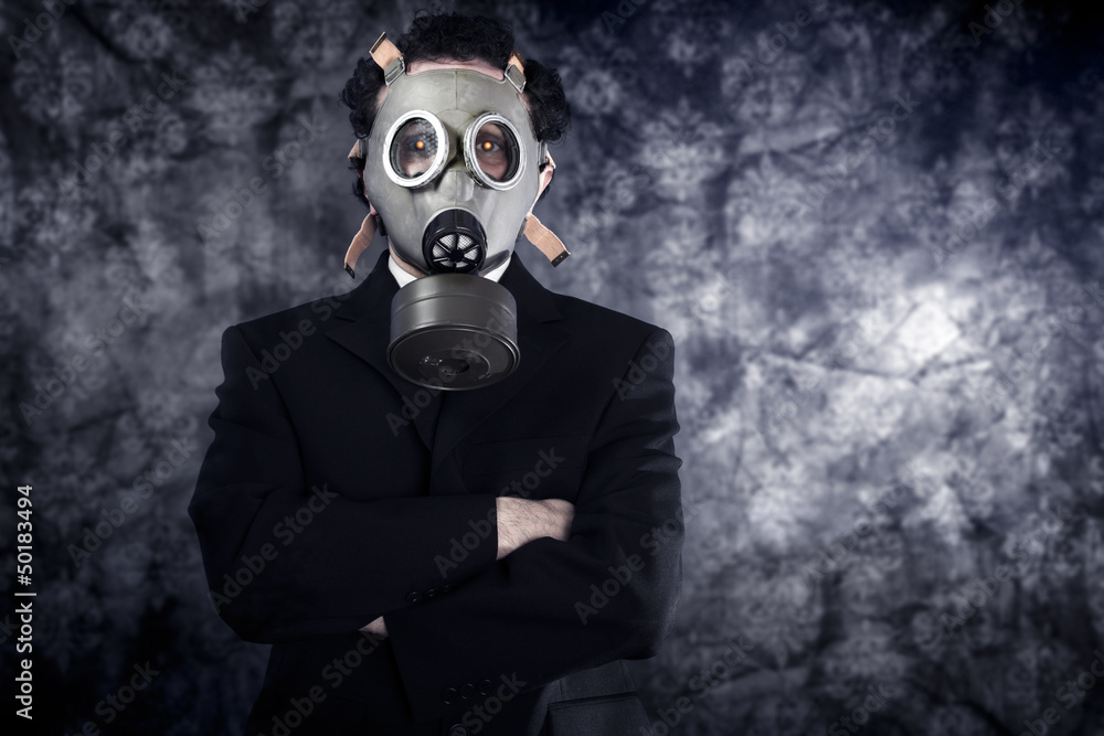 Risk concept, businessman with gas mask and black suit Risk concept, businessman with gas mask and black suit