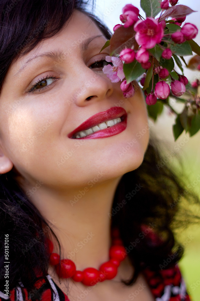 Portrait of the girl with a blossoming branch Portrait of the girl with a blossoming branch