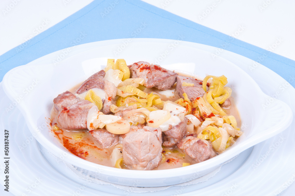 Stew with peppers, onions and cheese. Stew with peppers, onions and cheese.