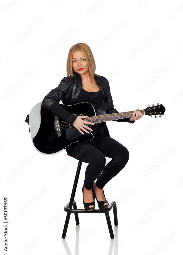 Sexy guitarist sitting with a black leather jacket Sexy guitarist sitting with a black leather jacket