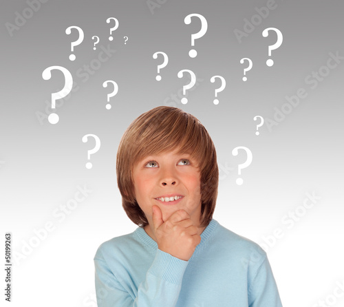 Doubtful preteen boy with many question symbols