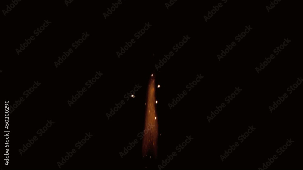 Sparks from a flame on black background Sparks from a flame on black background