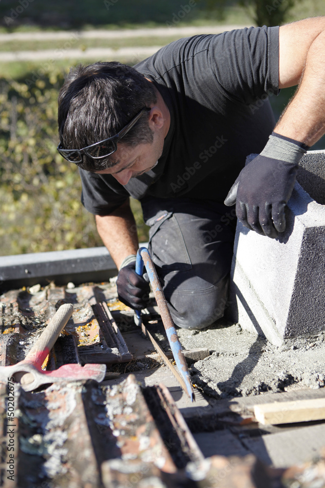 Roofer hard at work Roofer hard at work