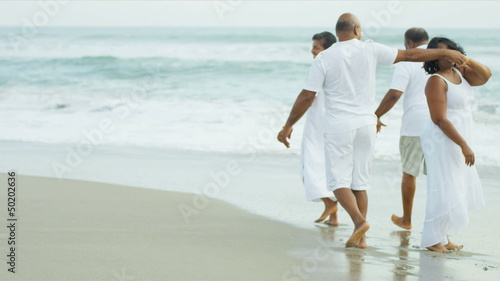 Happy Ethnic Seniors Beach Vacation