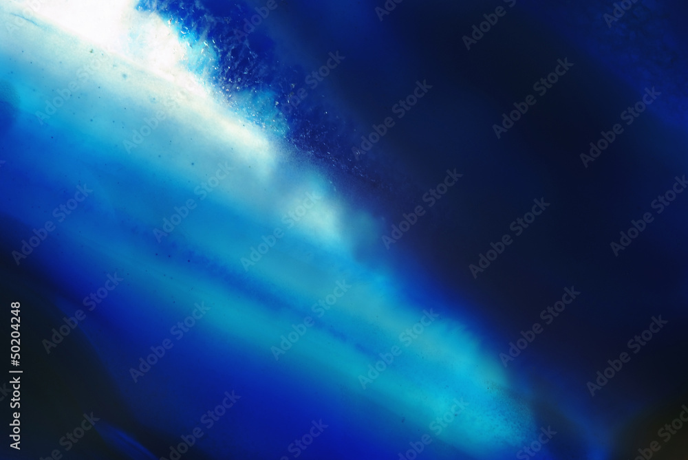 amethyst macroshot blue background closeup