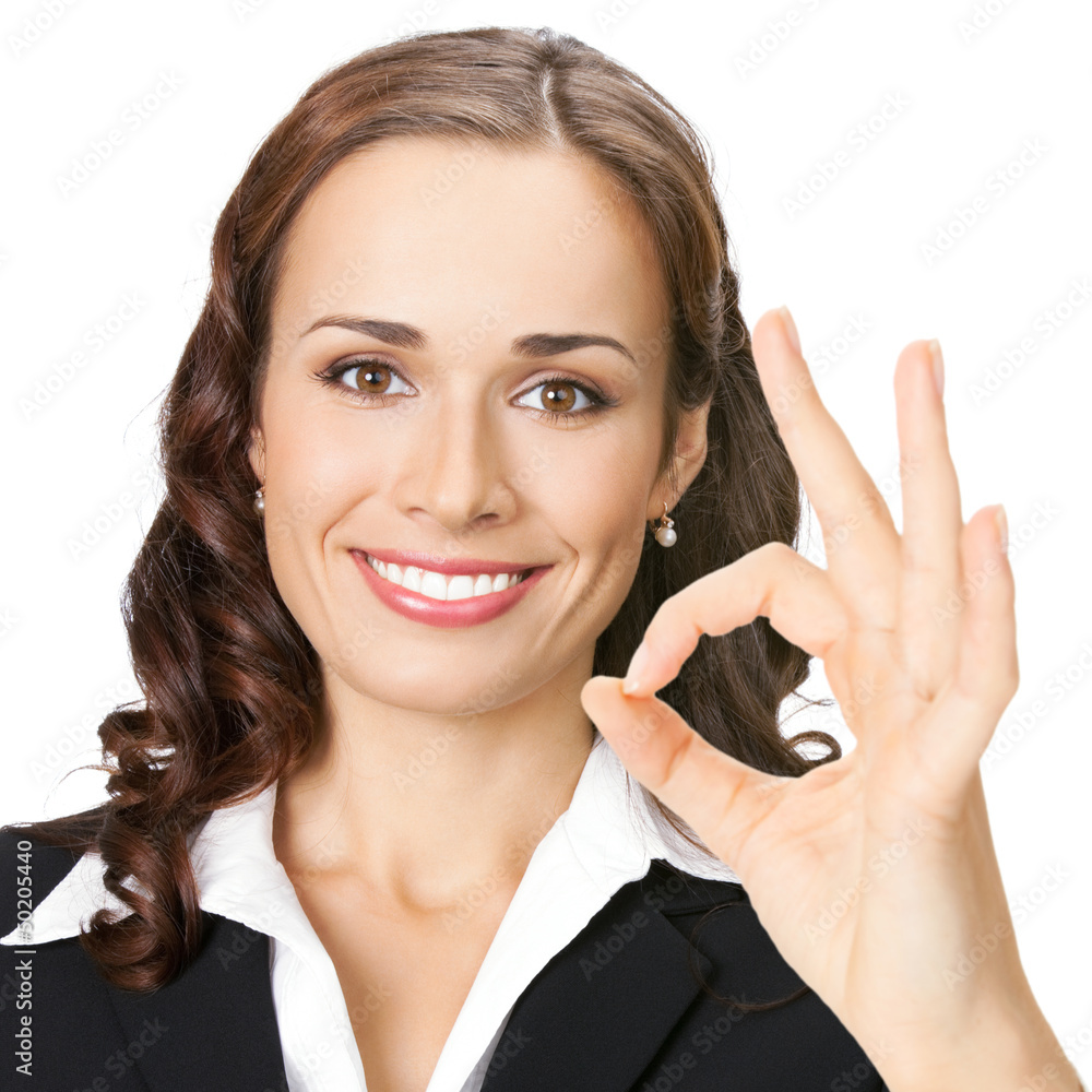 Businesswoman with okay gesture, isolated Businesswoman with okay gesture, isolated