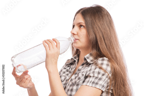 Woman drinking water from bottle