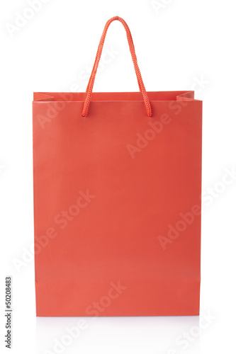 Red shopping bag on white, clipping path included photo