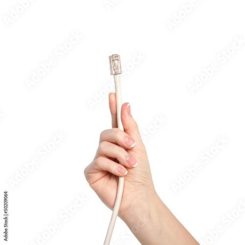 isolated woman hand holding a computer cable