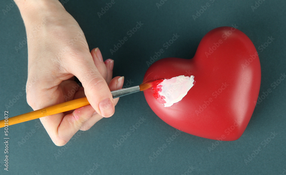 Hand paints white spot Hand paints white spot