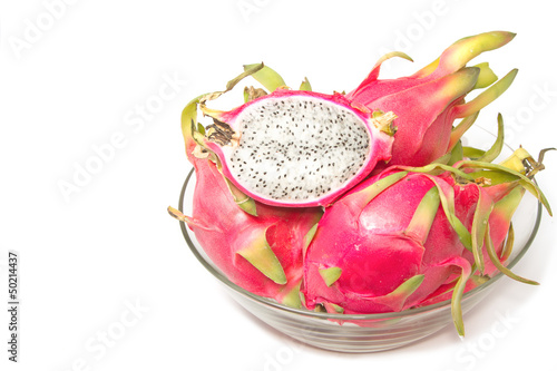 Dragon fruit in glass bowl on white background