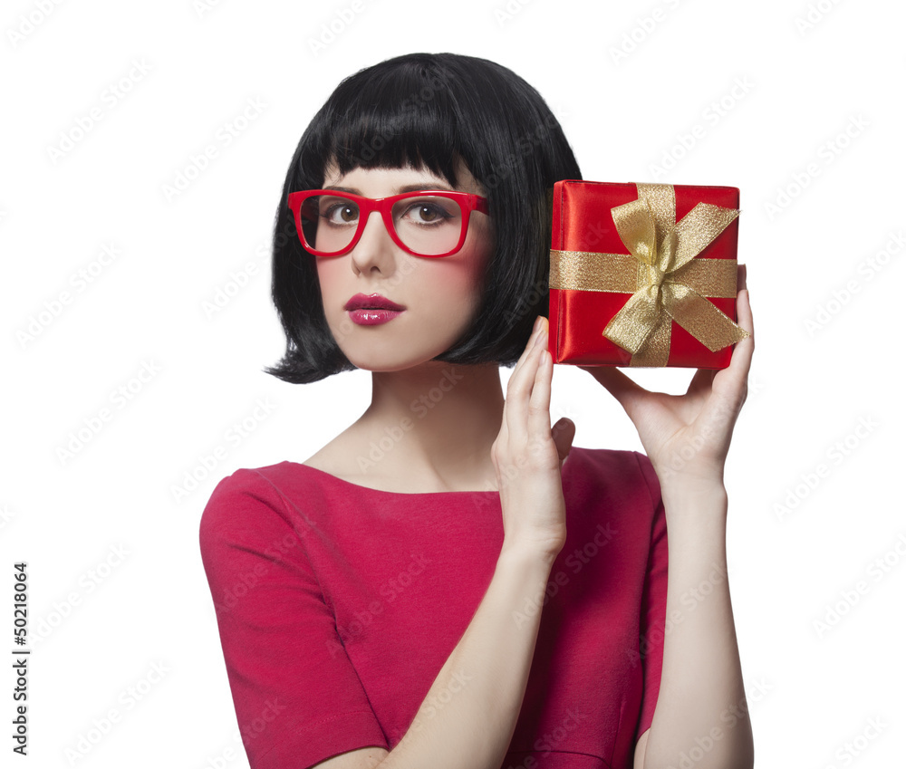 girl in dress with present box at white background. girl in dress with present box at white background.