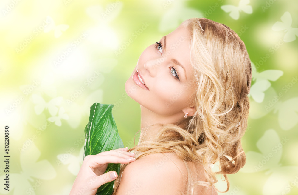 woman with green leaf and butterflies woman with green leaf and butterflies