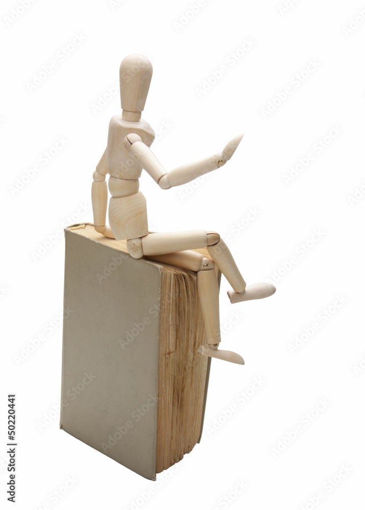 Wooden man and book Wooden man and book