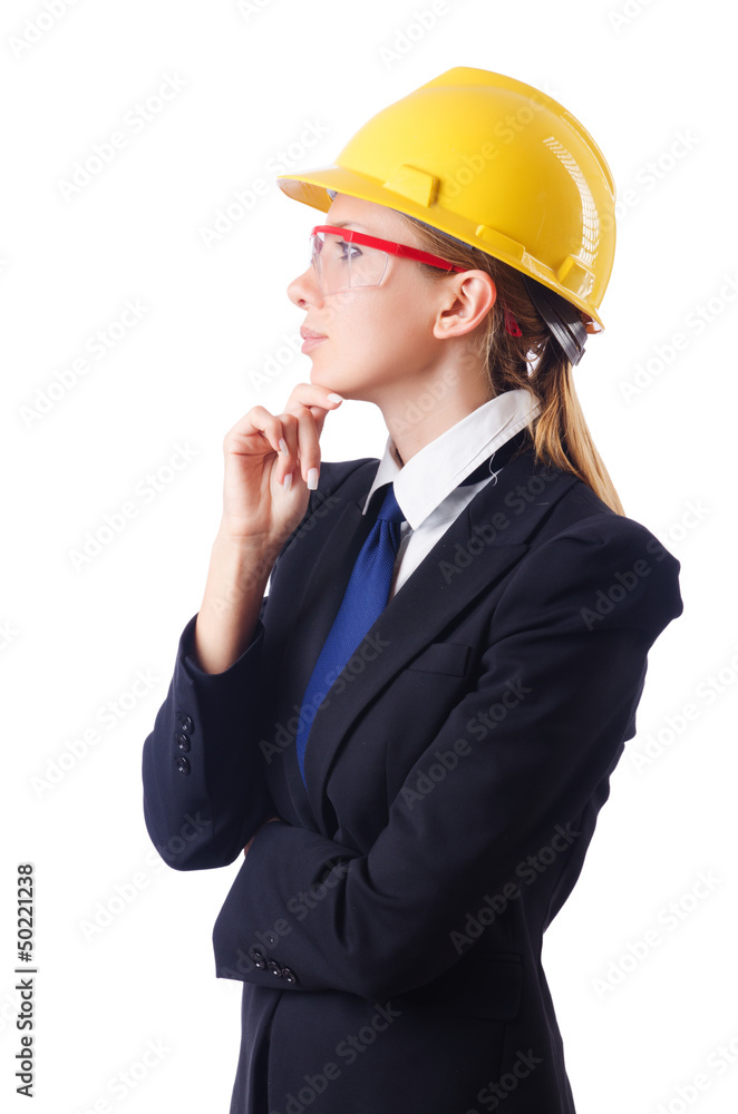 Young businesswoman with hard hat on white Young businesswoman with hard hat on white