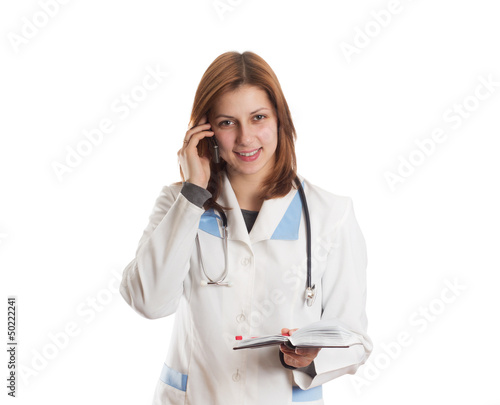 attractive woman doctor talking on the phone