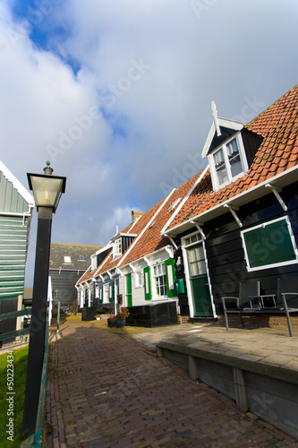 Typical Dutch houses with gardens in village Marken, Netherlands