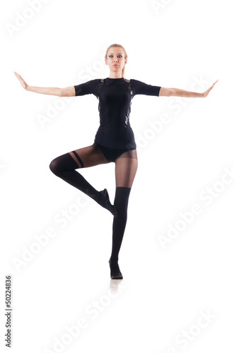 Young woman dancing on white background © Elnur