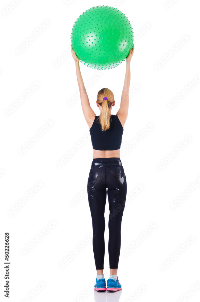Young girl with swiss ball doing exercise Young girl with swiss ball doing exercise