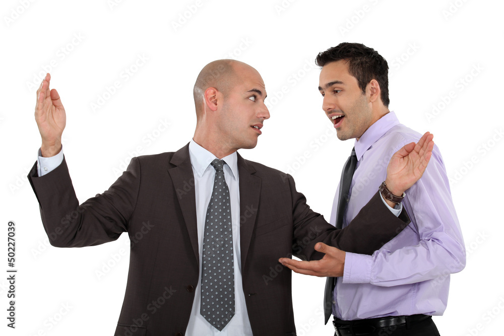 duo of businessman discussing in expressive way duo of businessman discussing in expressive way