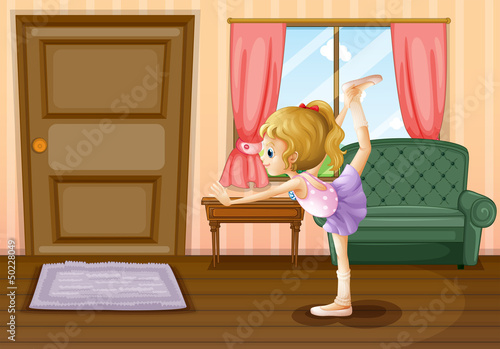 A ballet dancer inside her house