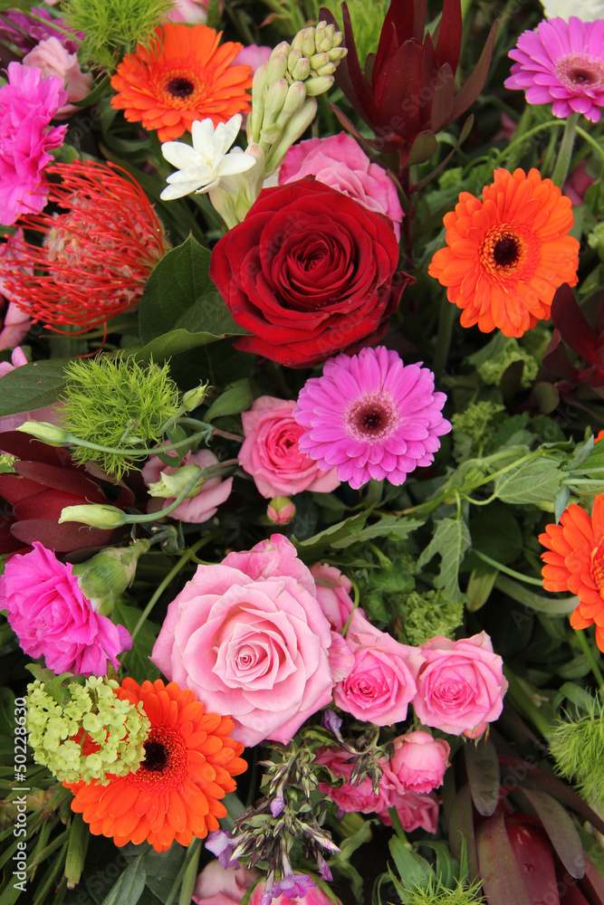 Flower arrangement in pink, red and orange
