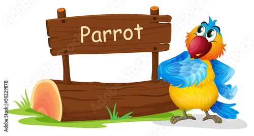 A wooden signage with a colorful bird