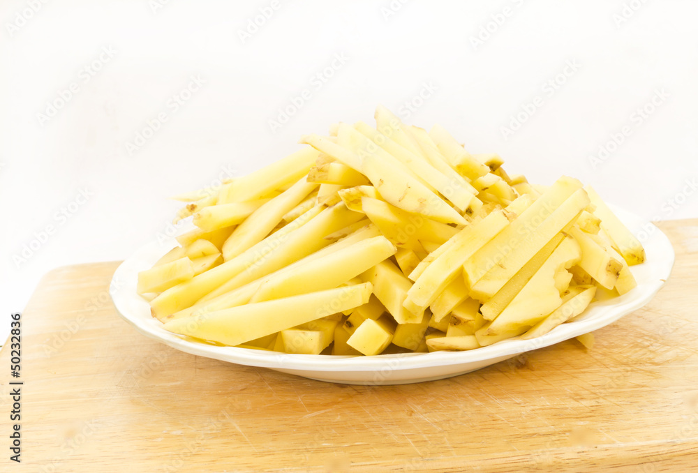 Fresh Potatoes with cut isolated on white
