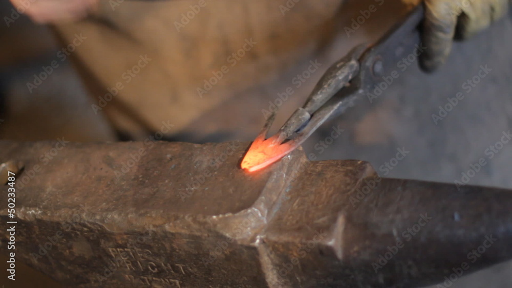 Blacksmith work. The blacksmith does arrow from metal. Blacksmith work. The blacksmith does arrow from metal.