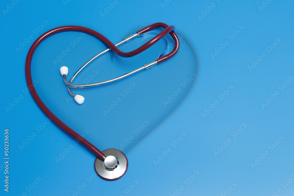 Red stethoscope in shape of heart Red stethoscope in shape of heart