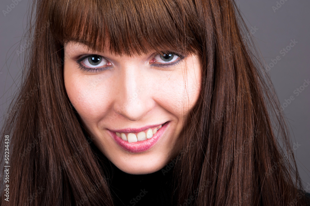 portrait of a smiling woman portrait of a smiling woman