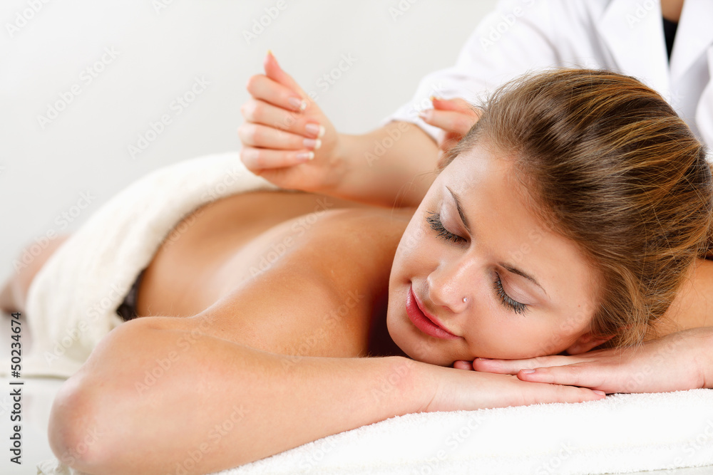Closeup of an attractive young woman receiving Closeup of an attractive young woman receiving