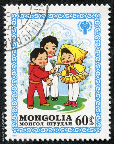 stamp shows Boys Presenting Flowers to a Girl
