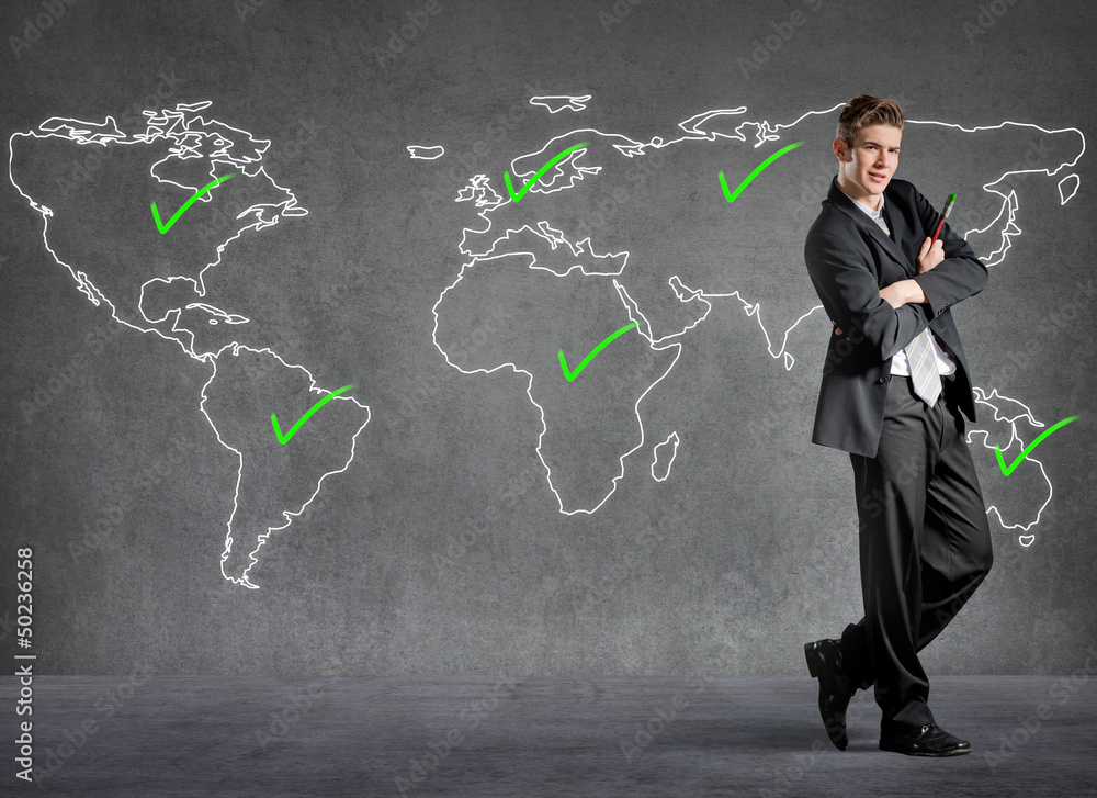 Businessman checked places on a world map Businessman checked places on a world map
