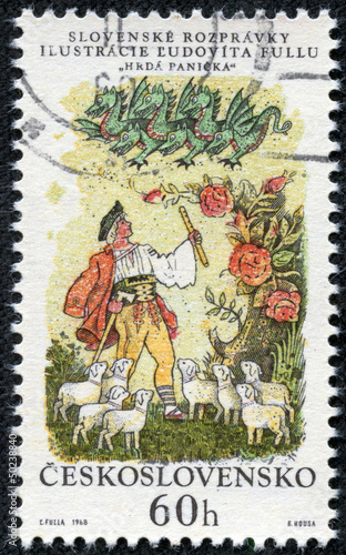 stamp shows a shepherd, sheep and green dragon