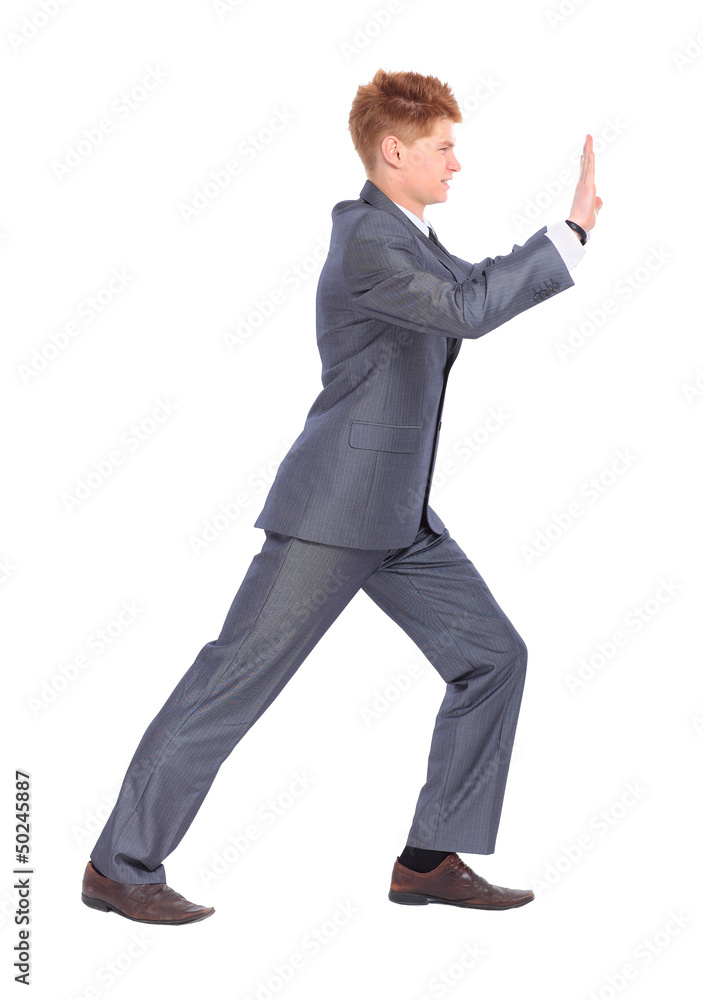The young handsome businessman isolated The young handsome businessman isolated
