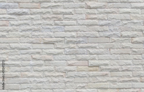 White brick wall in the background