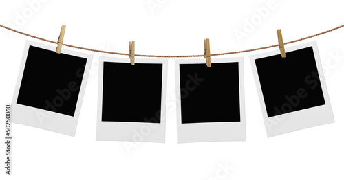 photos hanging on a rope