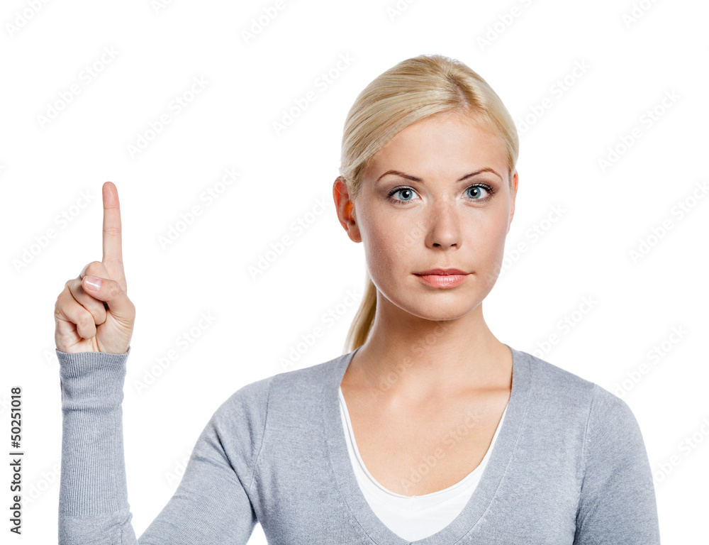 Girl making attention gesture with forefinger, isolated on white Girl making attention gesture with forefinger, isolated on white