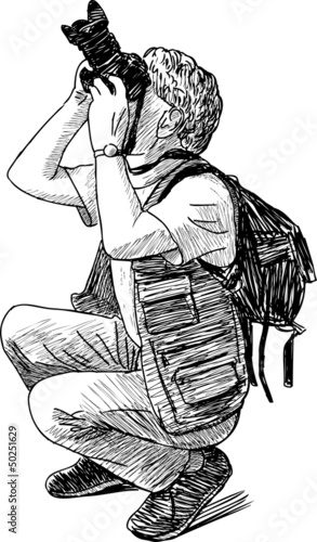 crouching photographer