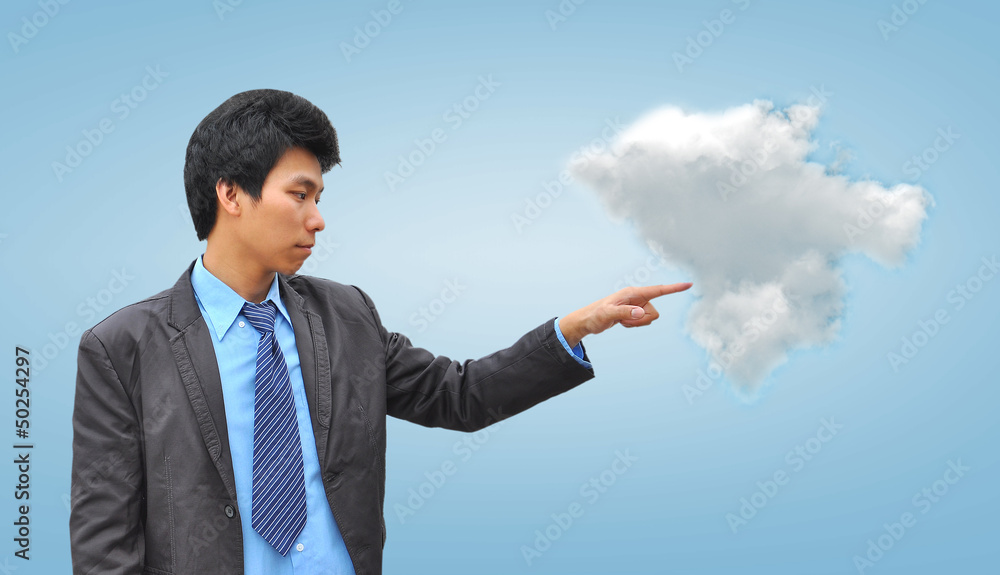 businessman hand pushing a cloud on a touch screen interface businessman hand pushing a cloud on a touch screen interface