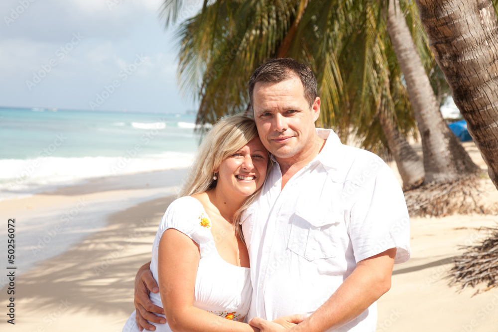 Happy couple in tropical beach