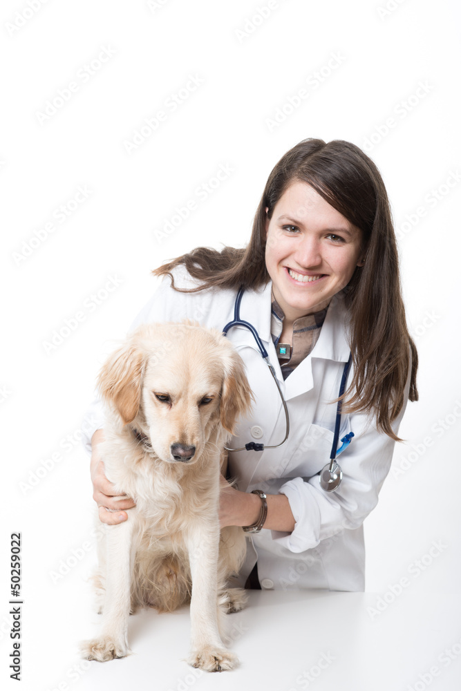 Young Veterinarian Embracing Beautiful Dog