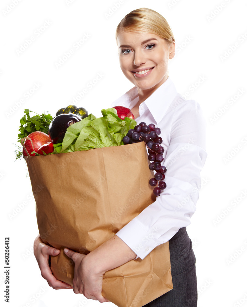 Young woman with a grocery shopping bag. Catering concept. Young woman with a grocery shopping bag. Catering concept.