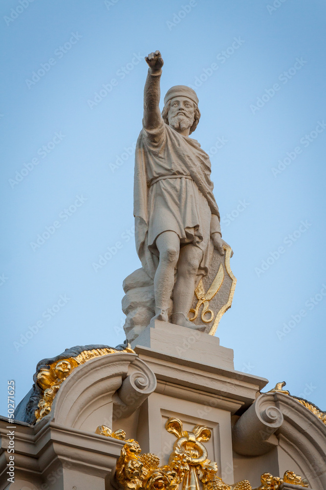 Statue on top of a building in the Grand Place, Brussels