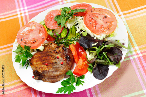 Grilled meat with salad