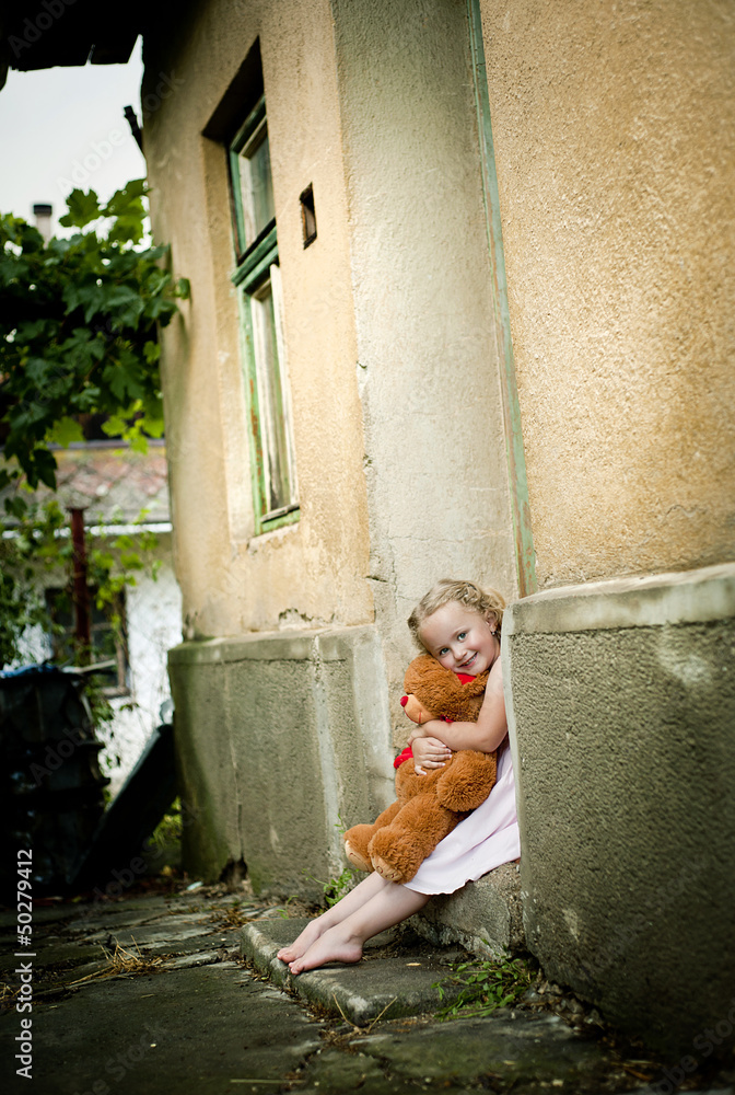 Girl with her teddy