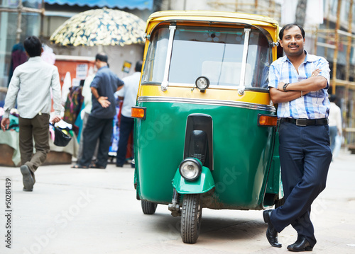 Indian auto rickshaw tut-tuk driver man photo
