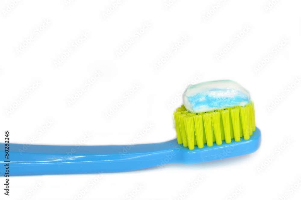 Toothbrush and toothpaste isolated Toothbrush and toothpaste isolated