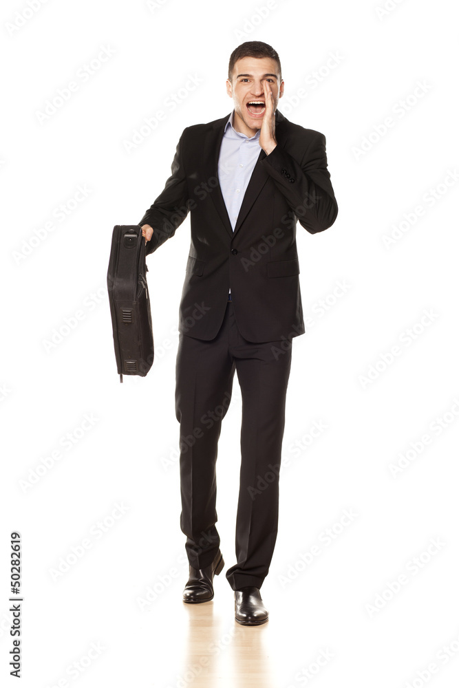 businessman with a laptop bag, shouting with his hand businessman with a laptop bag, shouting with his hand